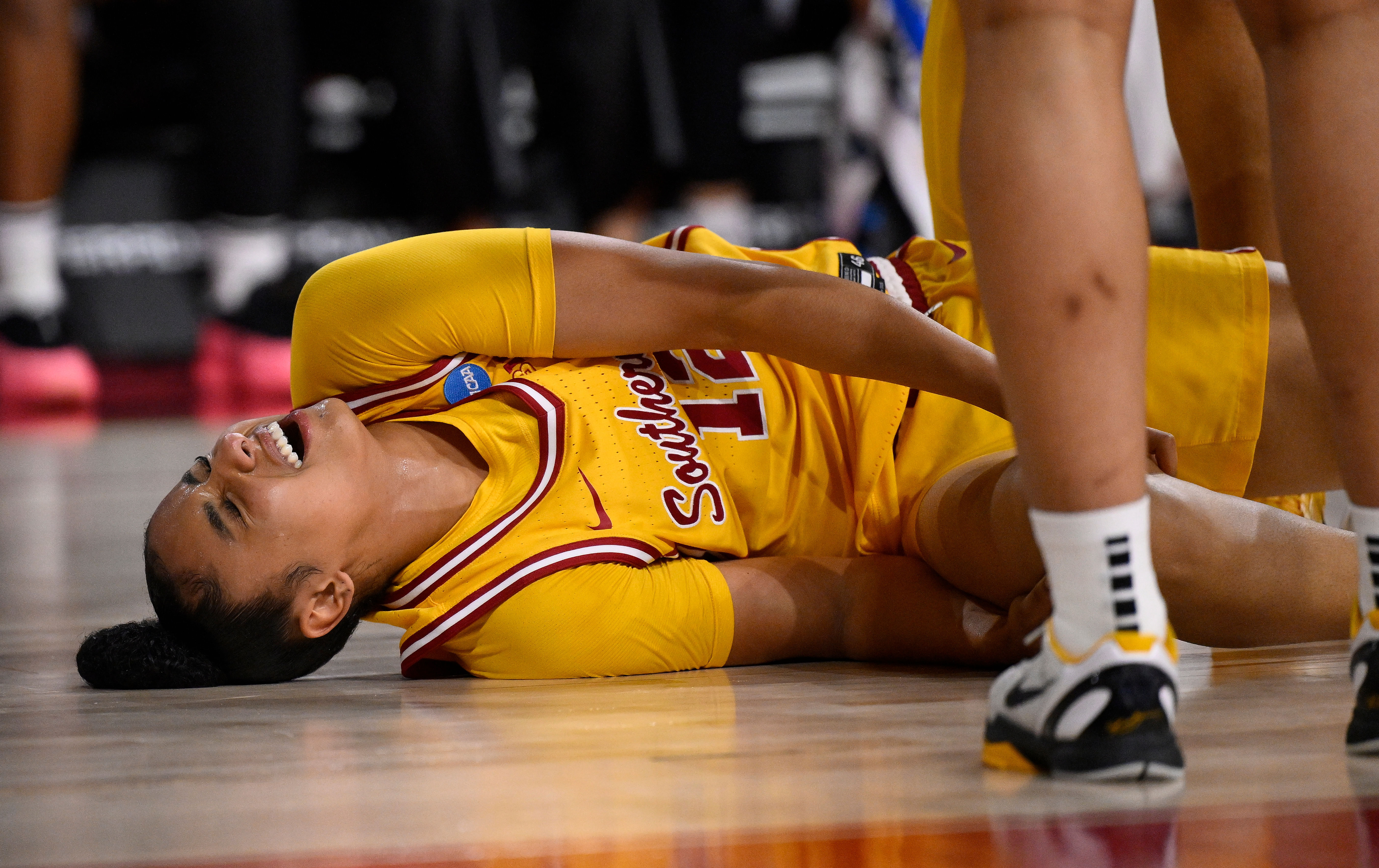 USC Trojans guard JuJu Watkins (12) grimaces after injuring her knee - Source: Imagn